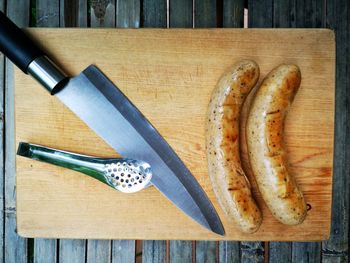 High angle view of bread on cutting board