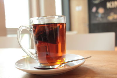 Close-up of tea in glass on table