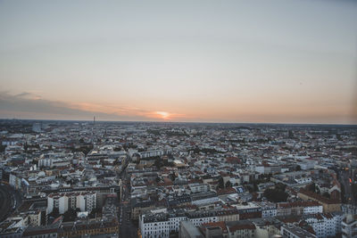 High angle view of townscape against sky during sunset