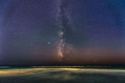 Scenic view of star field against sky at night