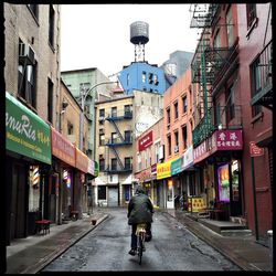 People walking on street in city