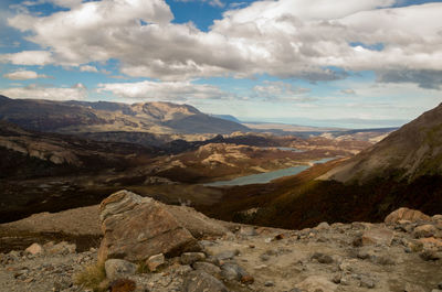 Scenic view of mountains against cloudy sky