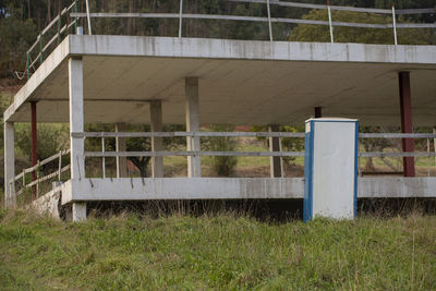 Abandoned building on field