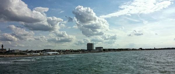 Scenic view of sea against cloudy sky