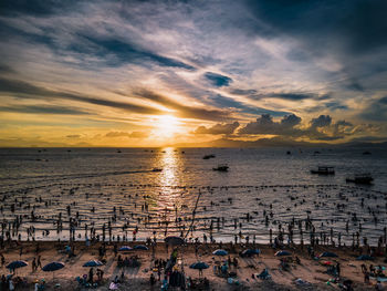 High angle view of beach against sky during sunset