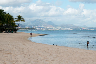 Scenic view of beach against sky