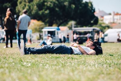 People sleeping on grass
