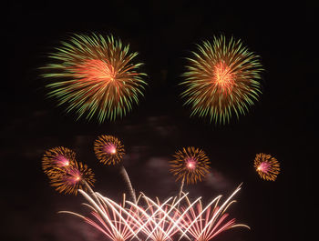Firework display at night
