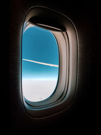 View of sky through airplane window