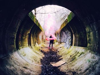 Woman in tunnel