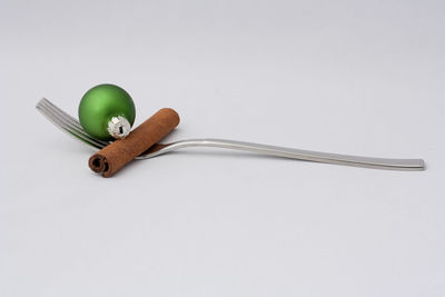 High angle view of bread on table against white background