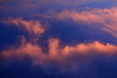 Low angle view of dramatic sky during sunset