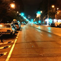 Traffic on city street at night