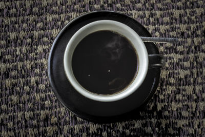 High angle view of coffee on table