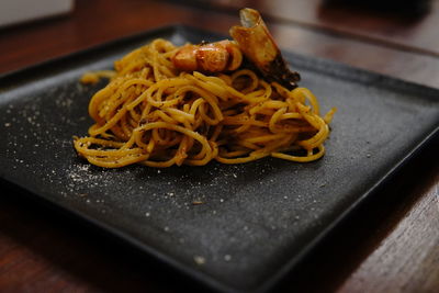 Close-up of ramen on cutting board