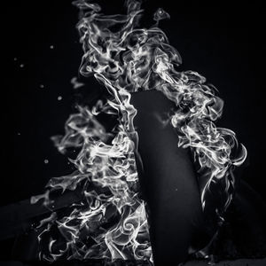 Close-up of abstract over black background