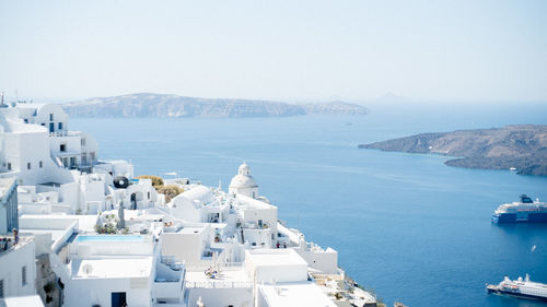 High angle view of cityscape by sea