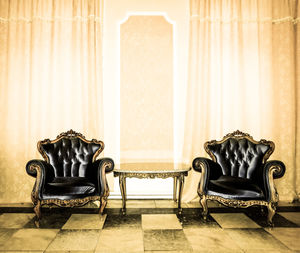 Chairs on table at home