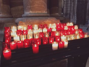 Close-up of red candles in temple