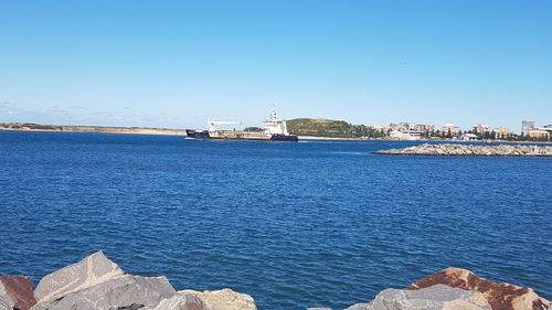 Scenic view of sea against clear sky