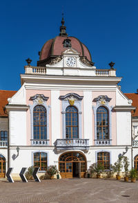 Low angle view of building against blue sky