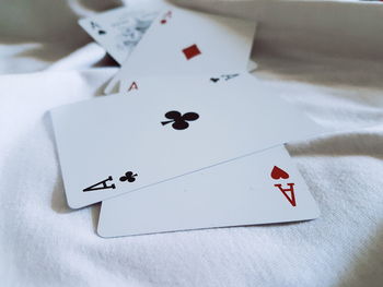Close-up of cards on bed