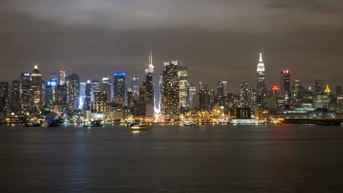 Illuminated city lit up at night