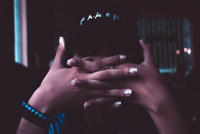 Close-up of man touching woman hand