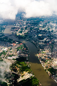 High angle view of river amidst buildings in city