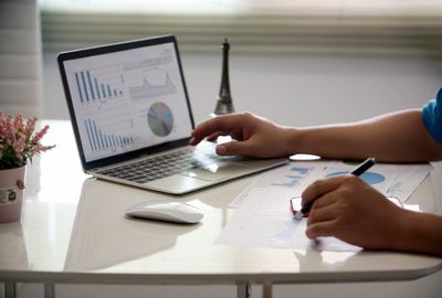 Close-up of businesswoman working in office