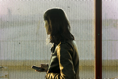 Close-up of man standing on floor