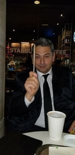 Portrait of man holding ice cream