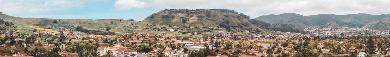 Panoramic shot of townscape against sky