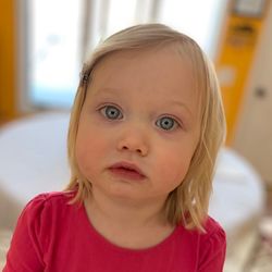 Portrait of cute girl at home