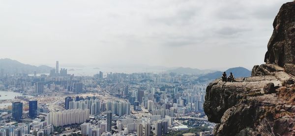 Panoramic view of city buildings against sky