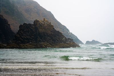 Scenic view of sea against clear sky