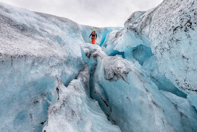Person on snow covered landscape