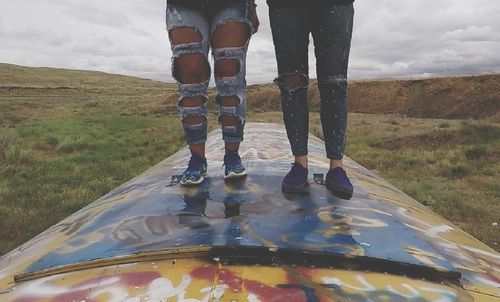 Low section of people standing in water