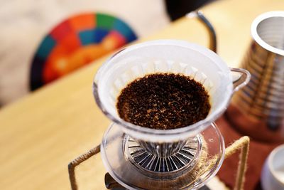 Close-up of coffee cup on table