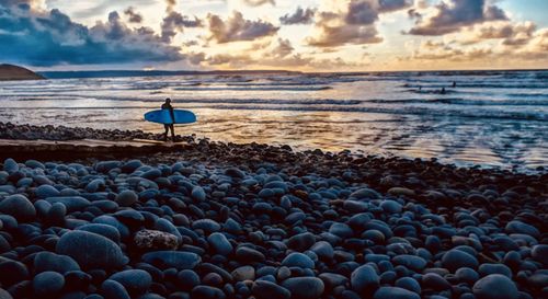 Scenic view of sea against sky during sunset