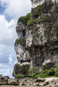 Low angle view of rock formation against sky