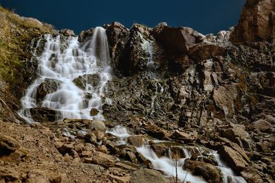 Low angle view of waterfall