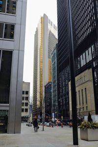 Modern buildings in city against sky