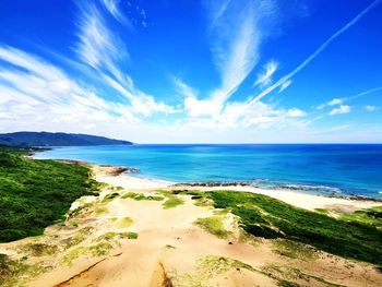 Scenic view of beach against sky