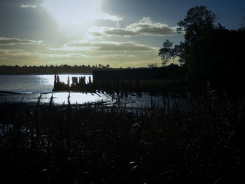 View of calm lake at sunset