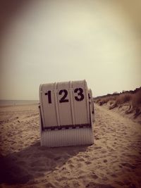 Hooded chairs on beach