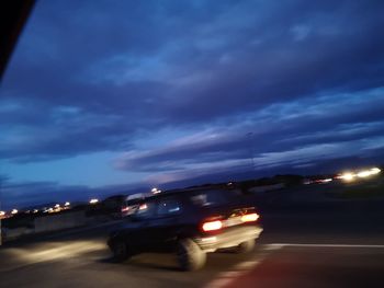 Car on street at night