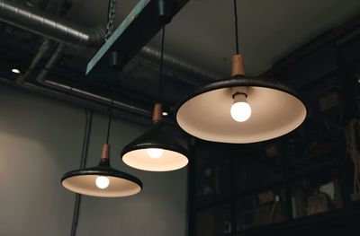 Low angle view of illuminated pendant light