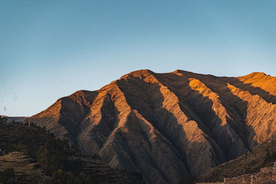 Scenic view of mountains against clear sky