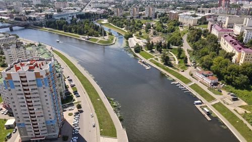 High angle view of river amidst buildings in city